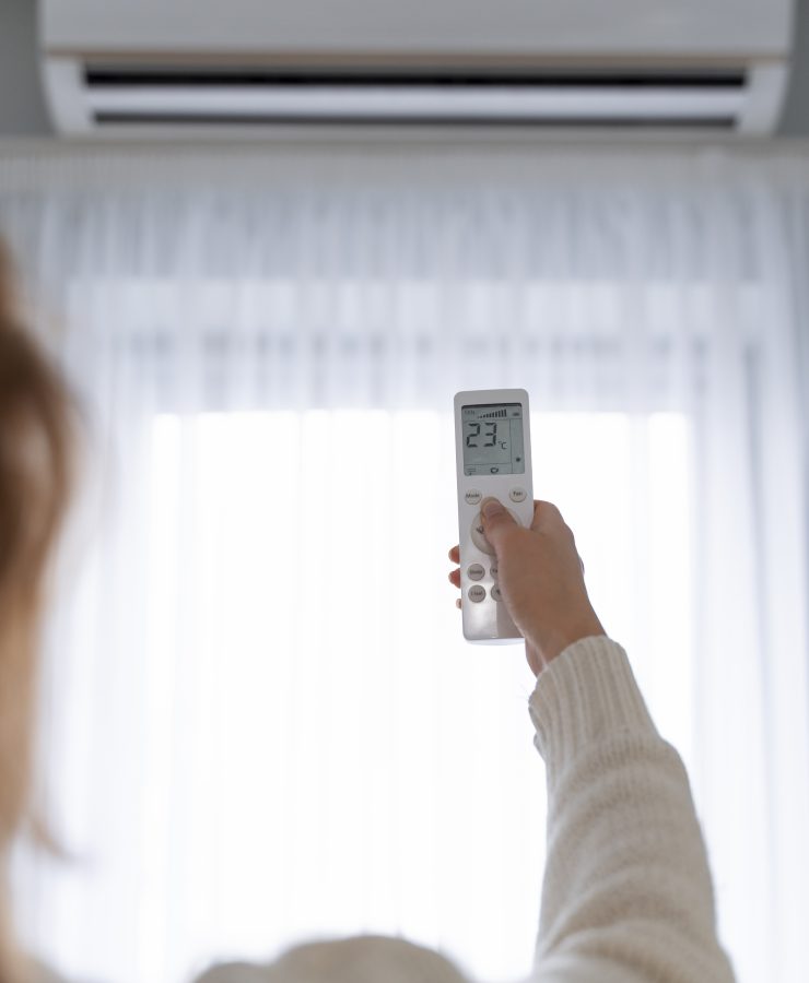 woman-holding-remote-start-heater